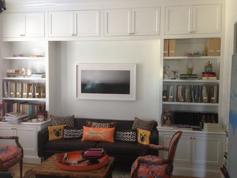 Wall storage around a fireplace