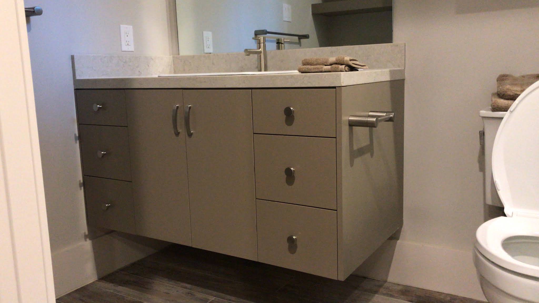 Wall-mounted gray vanity