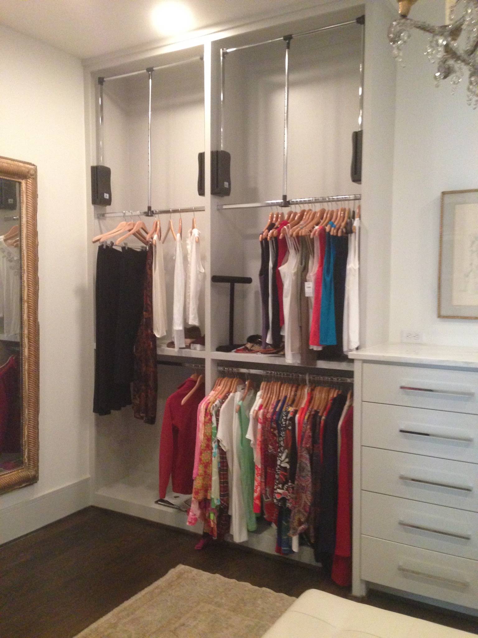 Closet with upper doors, hanging space and drawers