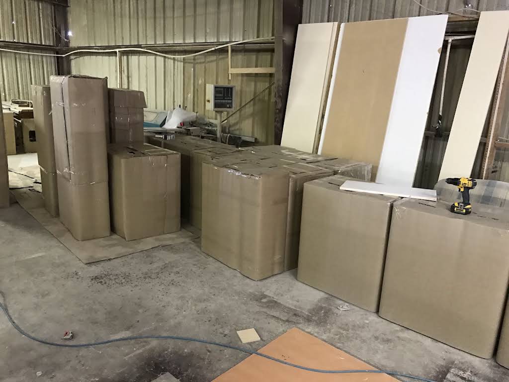 Unfinished cabinet cases in the workshop