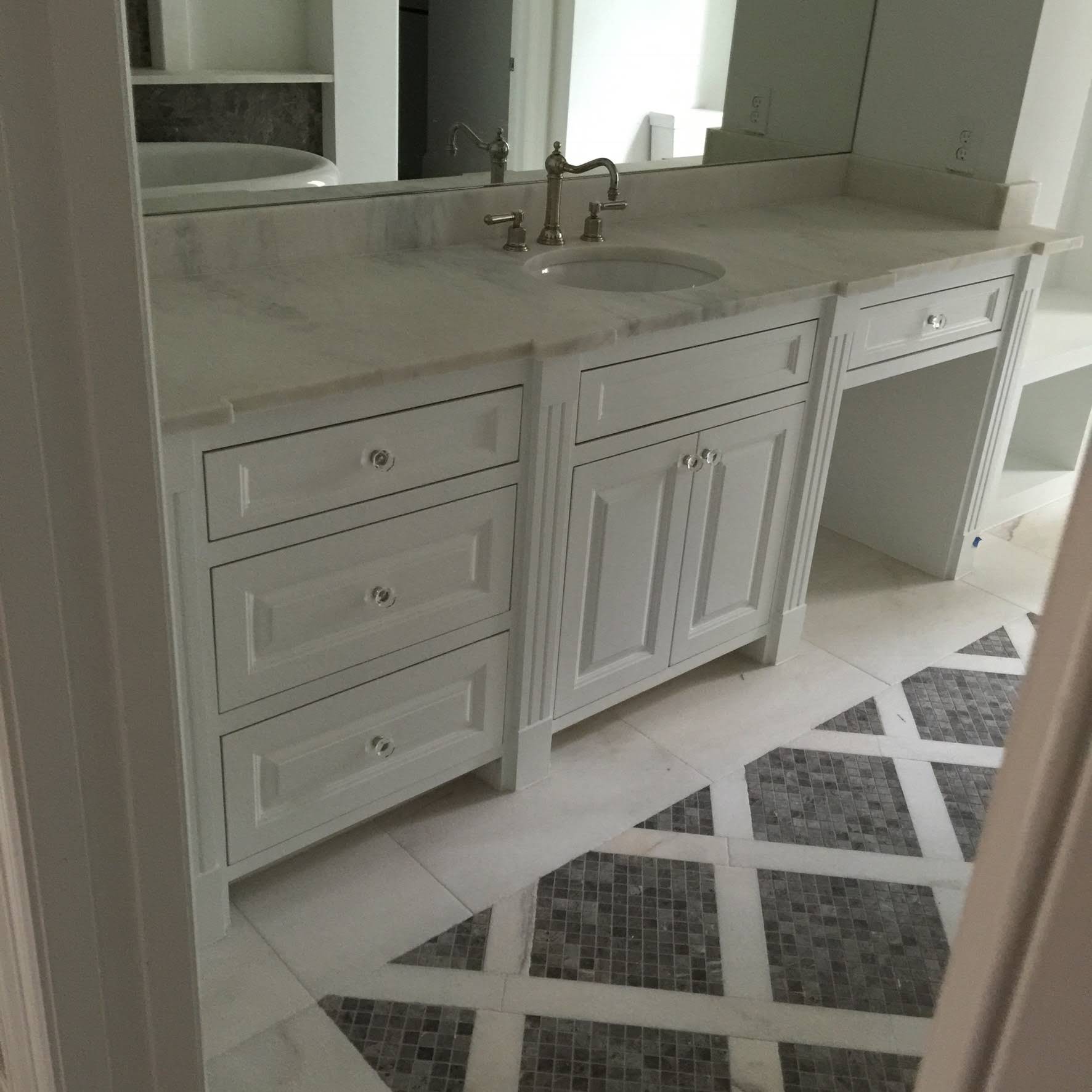 Light vanity with drawers on both sides